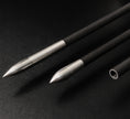 Three arrow shafts. Each with different ends on black background