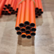 Open ends of Orranni Slayer Orange 30T .204 carbon arrow shafts showing shaft diameter